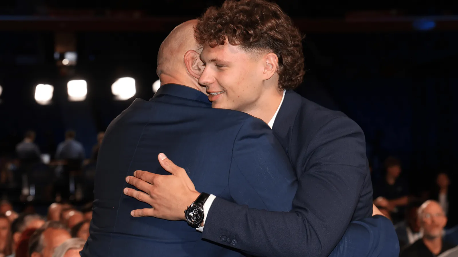 Simas-Ignatavicius-Hugging-Dad-16x9