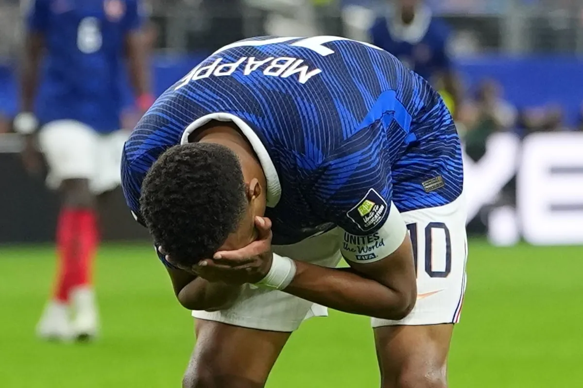 France's Kylian Mbappe reacts during the match. The 27-year-old star had the fewest touches of any forward in the first half with 15.Julio Cortez/The Associated Press
