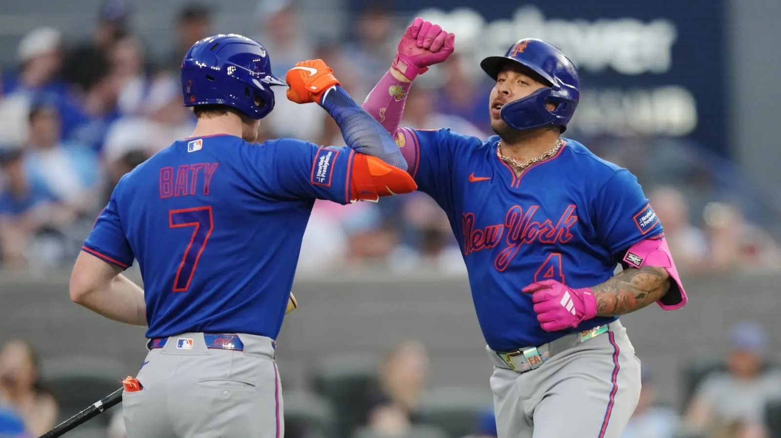 New York Mets' Francisco Alvarez (4) celebrates his solo home run against the Toronto Blue Jays with Brett Baty (7) during fifth inning MLB baseball action in Toronto on Tuesday, June 30, 2026. THE CANADIAN PRESS/Nathan Denette