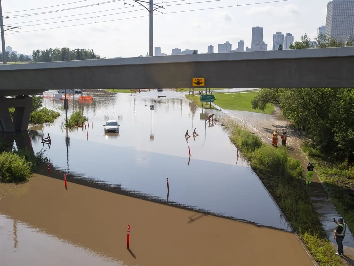 Heavy rain has caused flooding on 98 Avenue near the Muttart Conservatory on Monday, July 27, 2026 in Edmonton. Greg Southam-Postmedia