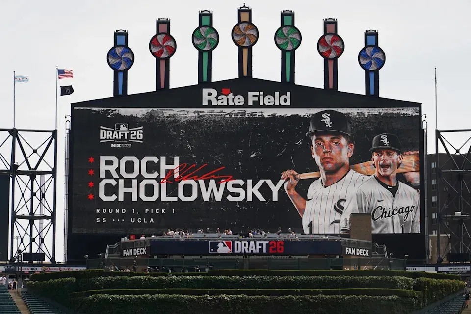 UCLA shortstop Roch Cholowsky goes No. 1 overall to the Chicago White Sox during the 2026 MLB Draft shown on the scoreboard before a baseball game between the Chicago White Sox and the Athletics Saturday, July 11, 2026, in Chicago. (AP Photo/David Banks) - The Associated Press