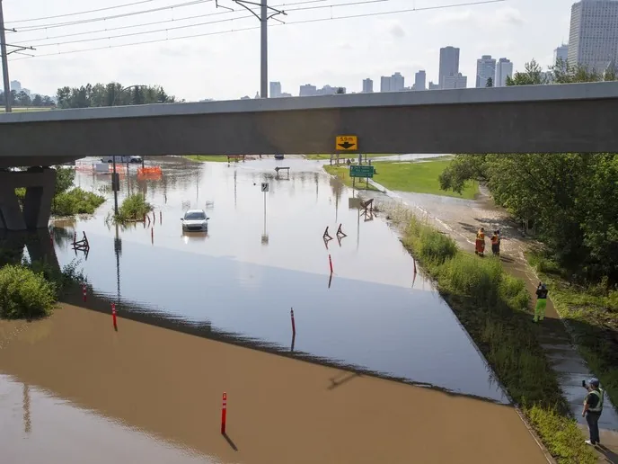 Heavy rain has caused flooding on 98 Avenue near the Muttart Conservatory on Monday, July 27, 2026 in Edmonton. Greg Southam-Postmedia